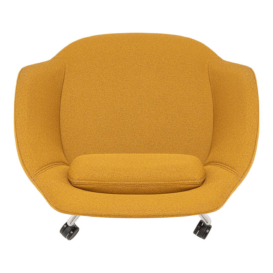 Stylish mustard yellow lounge chair with a smooth, minimalist design and soft texture, perfect for modern interiors.
