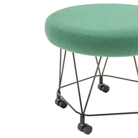 Mint green upholstered stool on black metal legs with wheels, featuring a round shape and modern design.