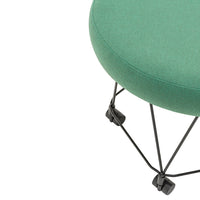 Green fabric round cushion with a sleek black wire base, showcasing a modern and minimalist design.