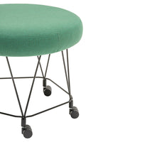 Green upholstered round ottoman with a sleek black metal base and rolling wheels. Perfect for modern decor.