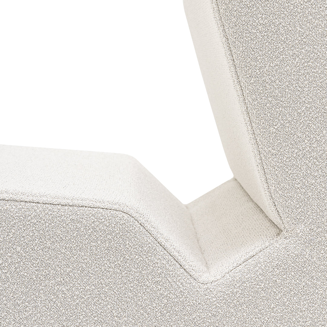 Textured silver upholstery with a sleek, modern design featuring subtle shimmering patterns.