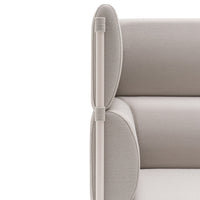 Light beige sofa with smooth, rounded edges and subtle textured fabric accents. Modern and minimalist design.