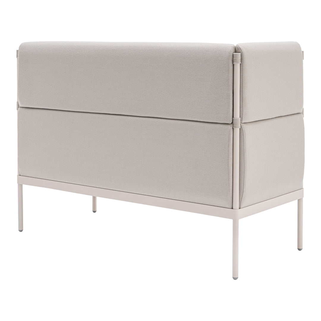 Light gray upholstered console table with a minimalist design and smooth, clean lines on a sleek white metal frame.