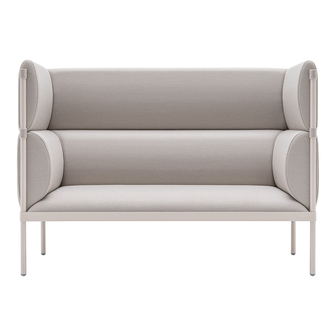 Beige upholstered loveseat with soft, smooth textures and rounded armrests, featuring a minimalist design.