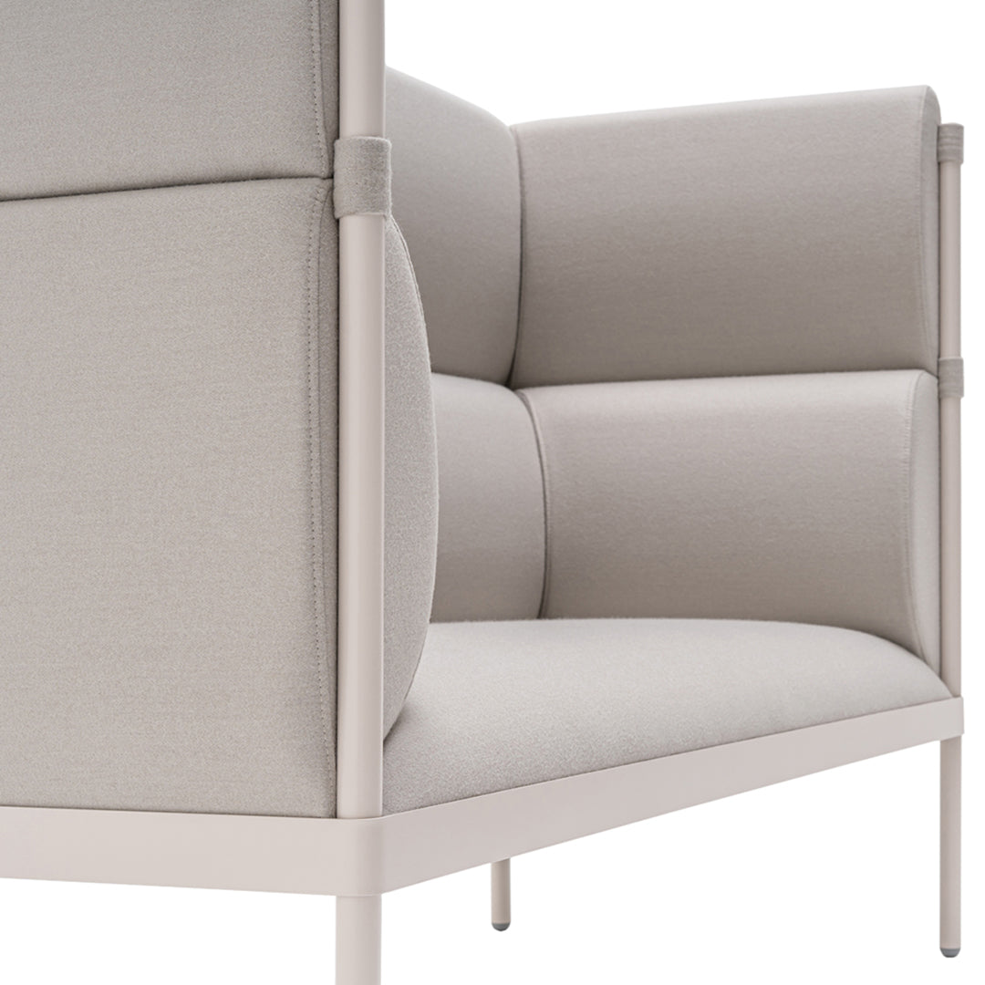 Modern beige sofa with clean lines and soft, textured fabric, featuring a minimalist design and neutral color palette.