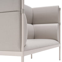Modern beige sofa with clean lines and soft, textured fabric, featuring a minimalist design and neutral color palette.