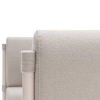 Light beige fabric upholstery with a subtle texture, complemented by sleek, minimalist metal accents.