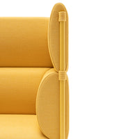 Bright yellow sofa with unique rounded side details and smooth, textured upholstery. Modern design for vibrant spaces.