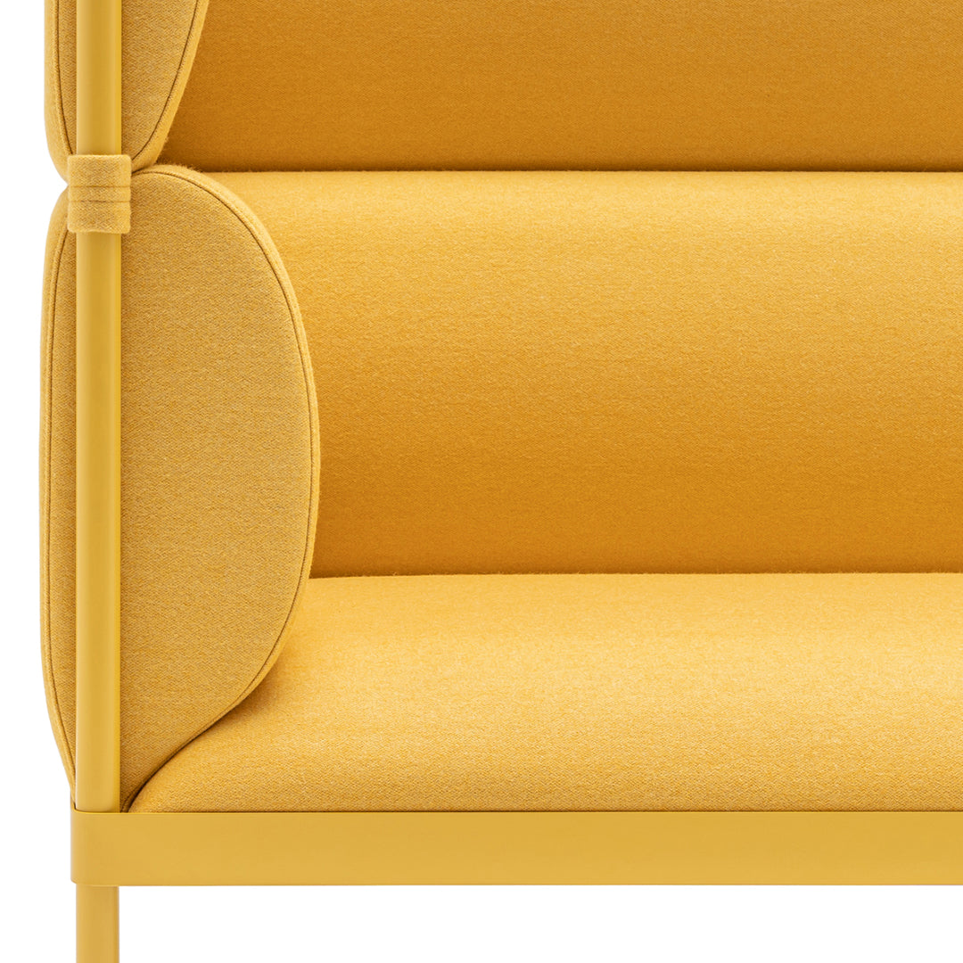 Bright yellow upholstered bench with smooth, rounded edges and a minimalist design. Ideal for modern interiors.
