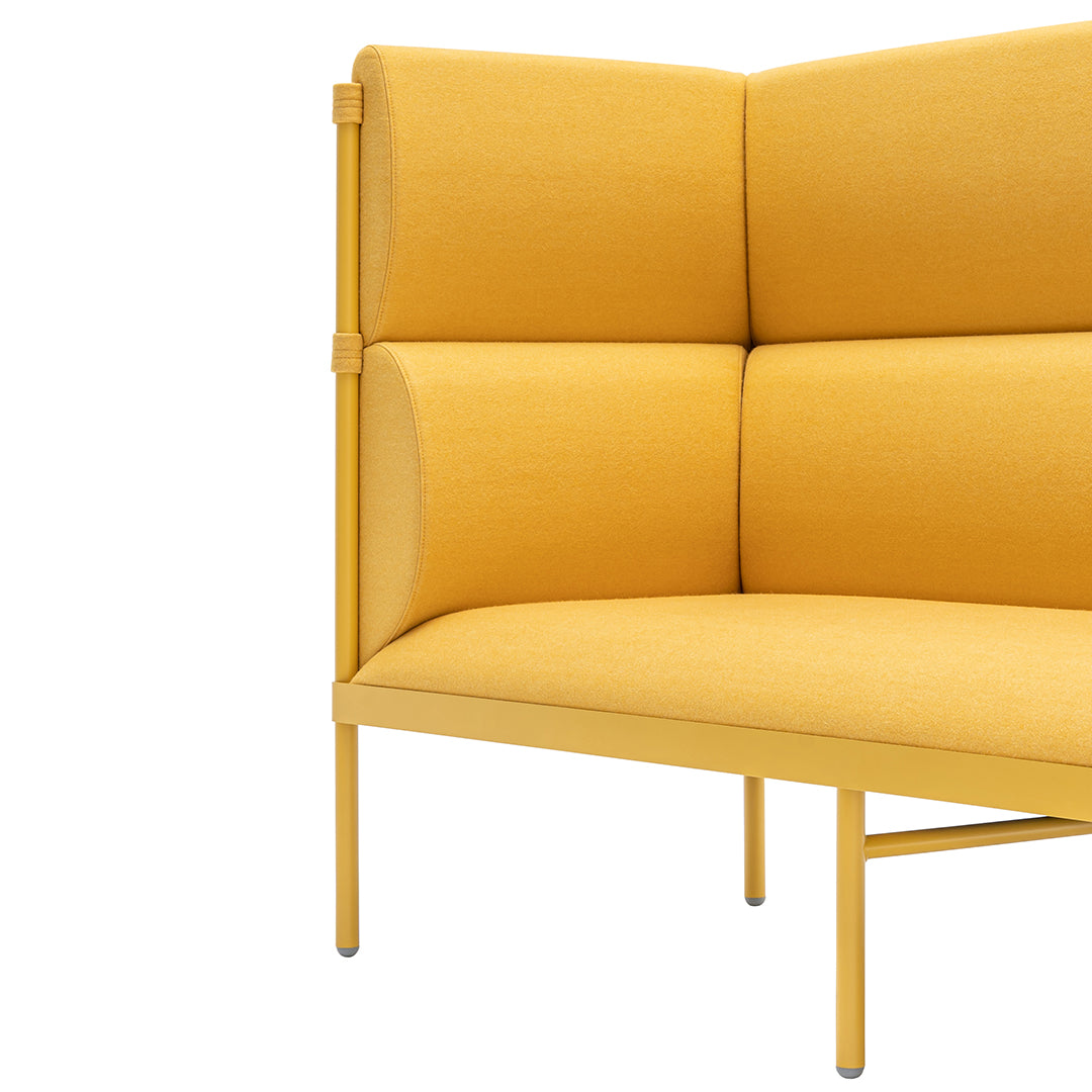 Modern yellow upholstered sofa with a sleek design and distinctive, structured back pattern. Ideal for stylish spaces.