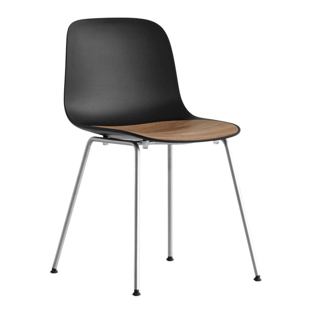 Black chair with a sleek plastic back and a light wood seat, featuring silver metal legs for a modern touch.