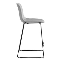 Gray upholstered bar stool with a sleek black metal frame, showcasing a modern and minimalist design.