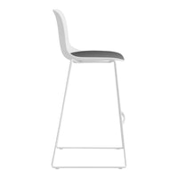 White bar stool with a sleek design and a contrasting black seat cushion, featuring minimalist lines and modern style.