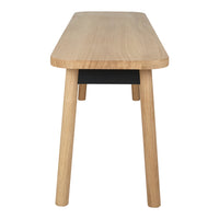 Light oak wood table with a smooth finish and black accent drawer, featuring clean lines and minimalist design.