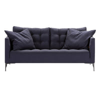 Navy blue tufted sofa with matching cushions, featuring a sleek modern design and subtle texture.