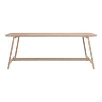 Light wood dining table with a sleek, minimalist design and natural finish; clean lines enhance modern aesthetics.