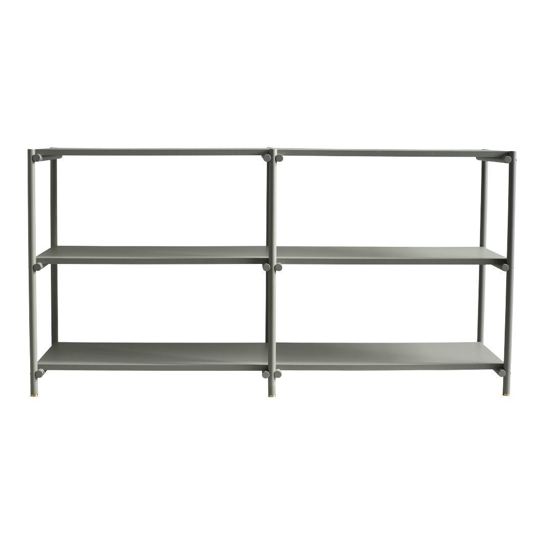Gray metal shelving unit with three open shelves, featuring a sleek, modern design and smooth, even surfaces.