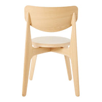 Light wood chair with a smooth, natural finish and minimalist design, featuring a seamless backrest and simple legs.