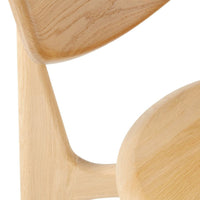 Natural light oak wood with smooth, curved edges and a minimalist design, showcasing its warm, organic patterns.