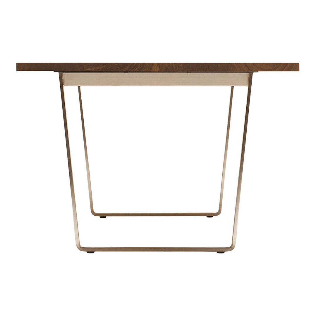 Wooden tabletop with rich brown tones and sleek white metal legs, featuring a minimalist and modern design.