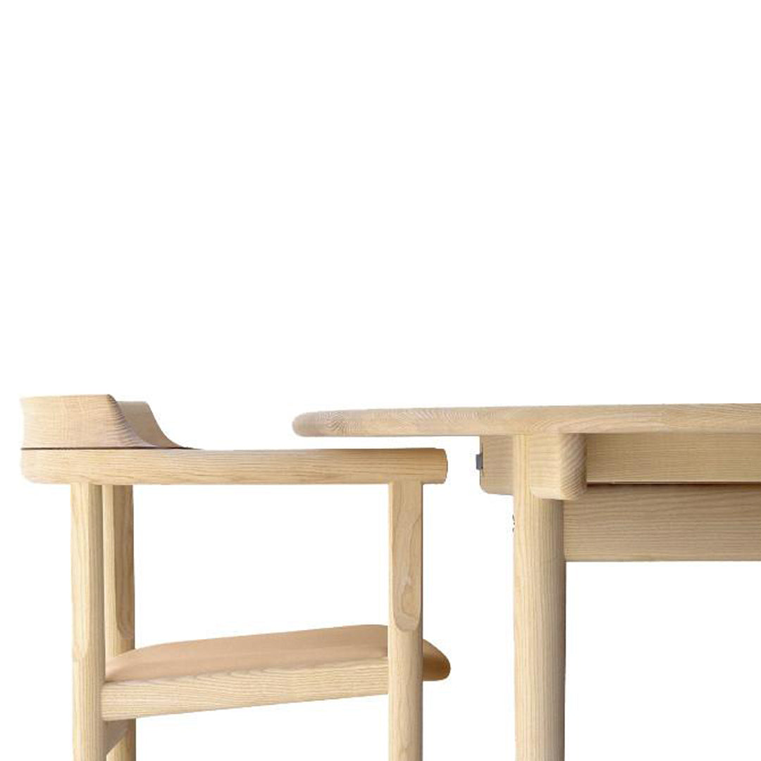 Minimalist wooden chair and table in natural light wood finish, featuring clean lines and a simple design.