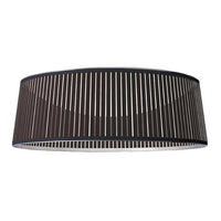 Black striped lamp shade with a sleek, modern design and elongated oval shape. Ideal for contemporary decor.