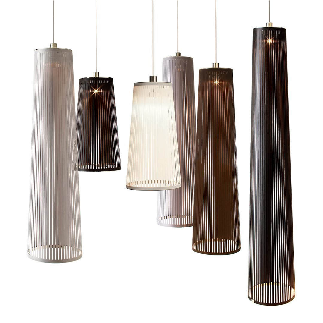 Textured pendant lights in muted tones of white, gray, and brown with vertical ribbed patterns. Stylish and modern design.