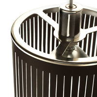 Black cylindrical lamp with vertical silver stripes and metallic accents. Modern, sleek design for contemporary decor.