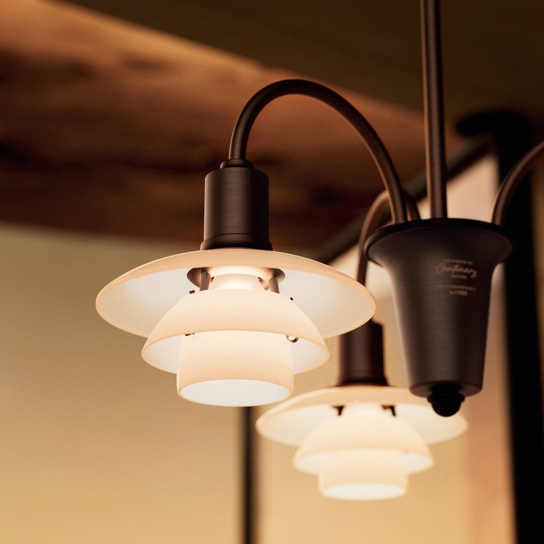Elegant white glass shades with a sleek black metal finish, featuring a minimalist design and soft, warm lighting.