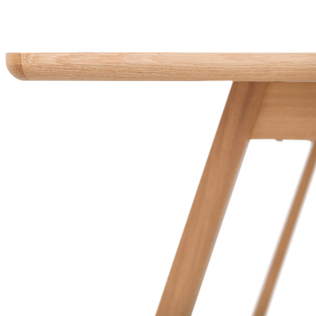 Natural wood finish with smooth edges and minimalistic design; light beige tones create a warm aesthetic.