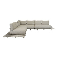 Luxe beige sectional sofa with plush cushions and a sleek, minimalist design. Perfect for modern interiors.