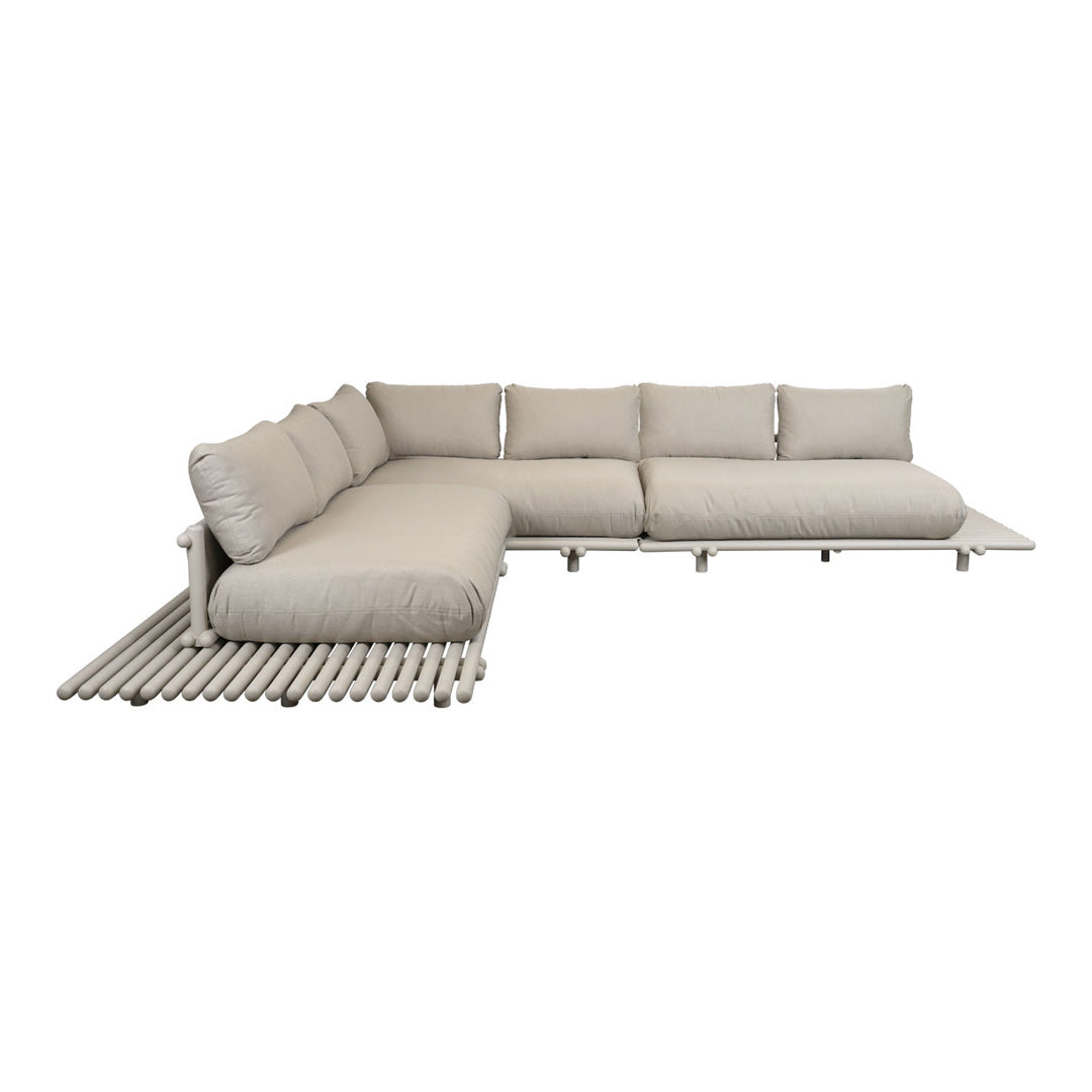 Beige L-shaped sectional sofa with plush cushions and sleek fabric texture, ideal for modern interior styling.