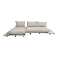 Light beige sofa with three plush cushions and sleek wooden slats, offering a minimalistic and modern design.