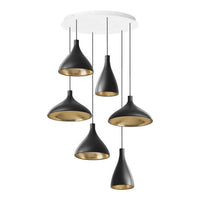 Five pendant lights with a sleek black exterior and gleaming gold interior, suspended from a white ceiling mount.