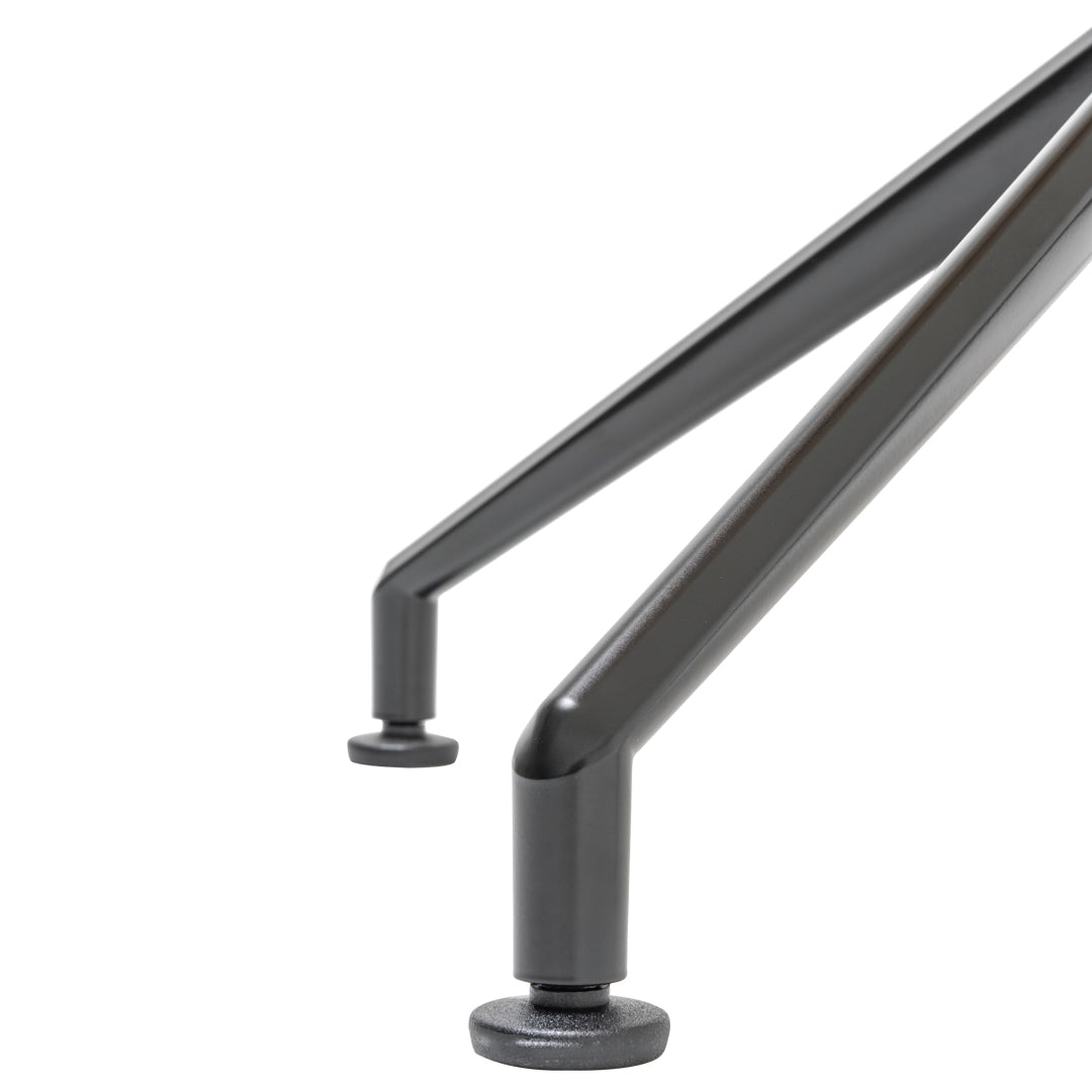 Sleek, angled metal legs in a polished dark gray finish, featuring a modern minimalist design.