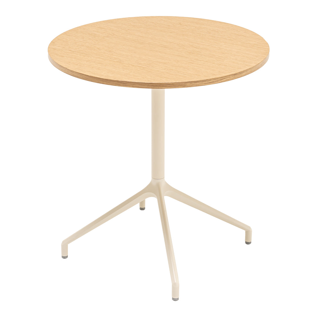 Light oak round tabletop with a smooth finish and a sturdy cream-colored metal base, perfect for modern decor.