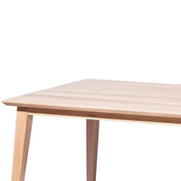 Light natural wood tabletop with subtle grain pattern and clean, angled legs. Ideal for modern interiors.