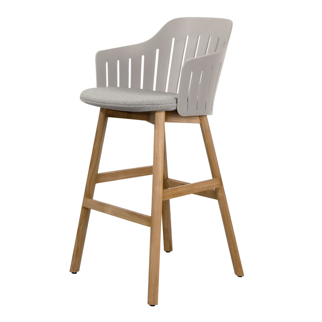 Light gray bar stool with a slatted back and natural wood legs, featuring a sleek and modern design.