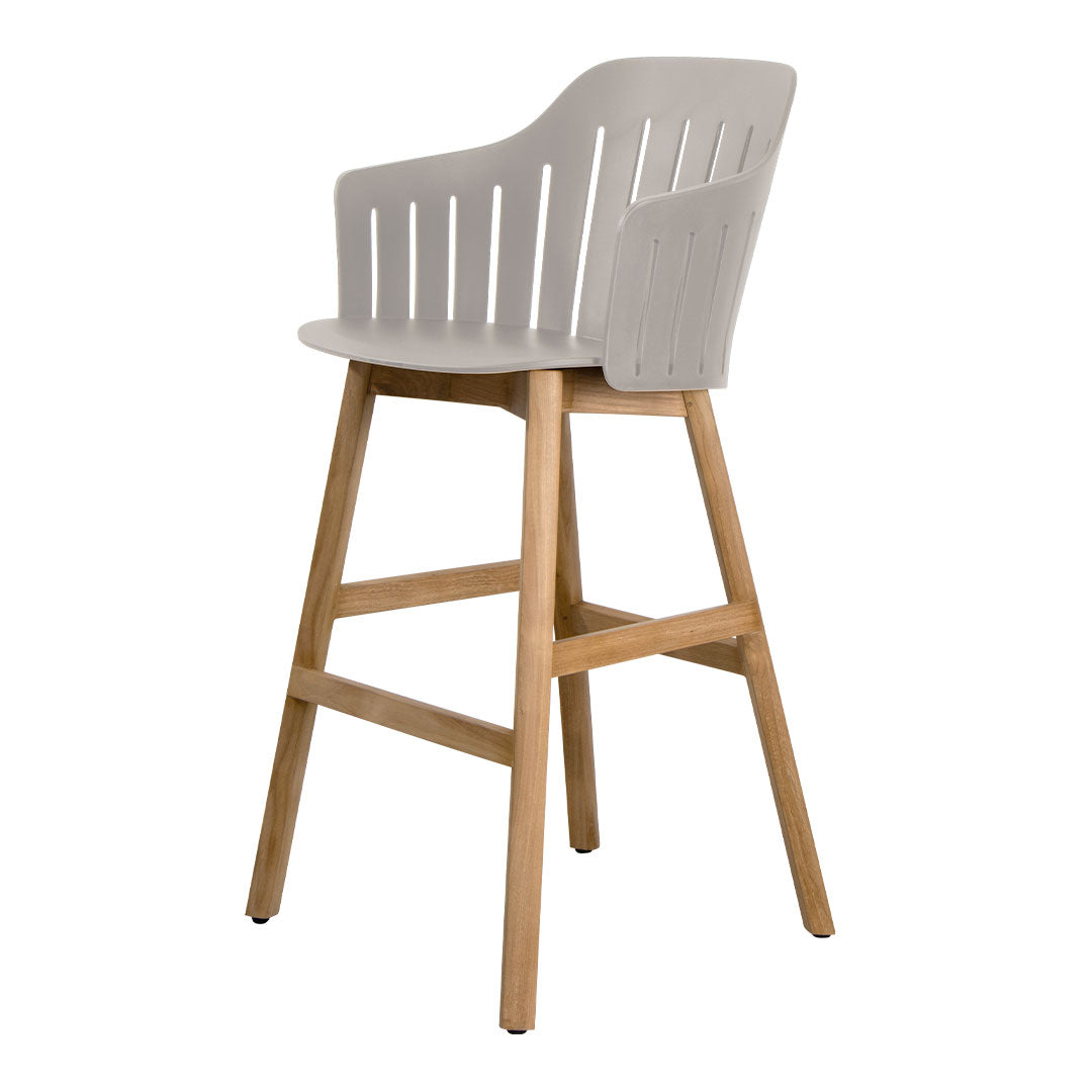 Light gray chair with vertical slats and a natural wood base, showcasing a modern, minimalist design.