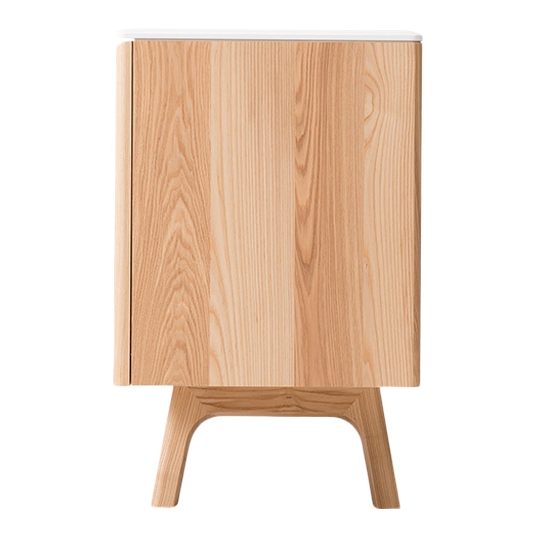 Natural light wood cabinet with a smooth finish and subtle grain patterns, featuring minimalist design and tapered legs.