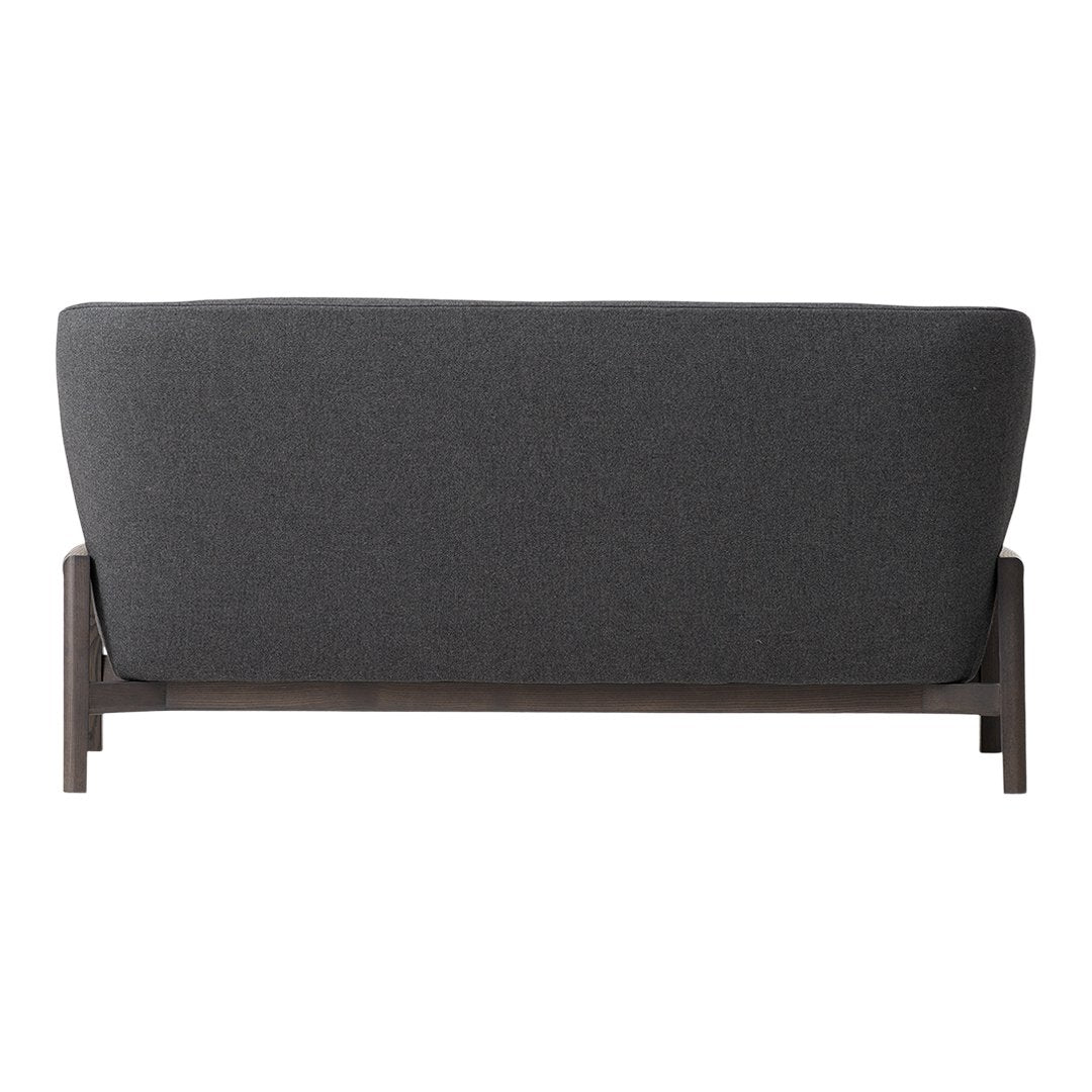 Gray upholstered sofa with a simple, modern design and a sturdy dark wooden frame.