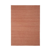 Rust-colored woven rug with a subtle linear pattern for a warm, textured look in any space.