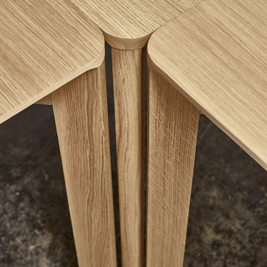Light oak wood table with a smooth, natural finish and sleek, minimalistic design. Ideal for modern decor.