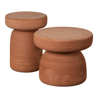 Terracotta stools featuring smooth, round shapes and a minimalist design, perfect for modern decor.
