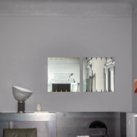 Rectangular mirrors with a sleek silver frame and vibrant yellow accents; modern and stylish home decor.