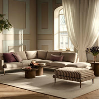 Beige sectional sofa with purple accent pillows and a striped ottoman against soft neutral tones and warm natural light.