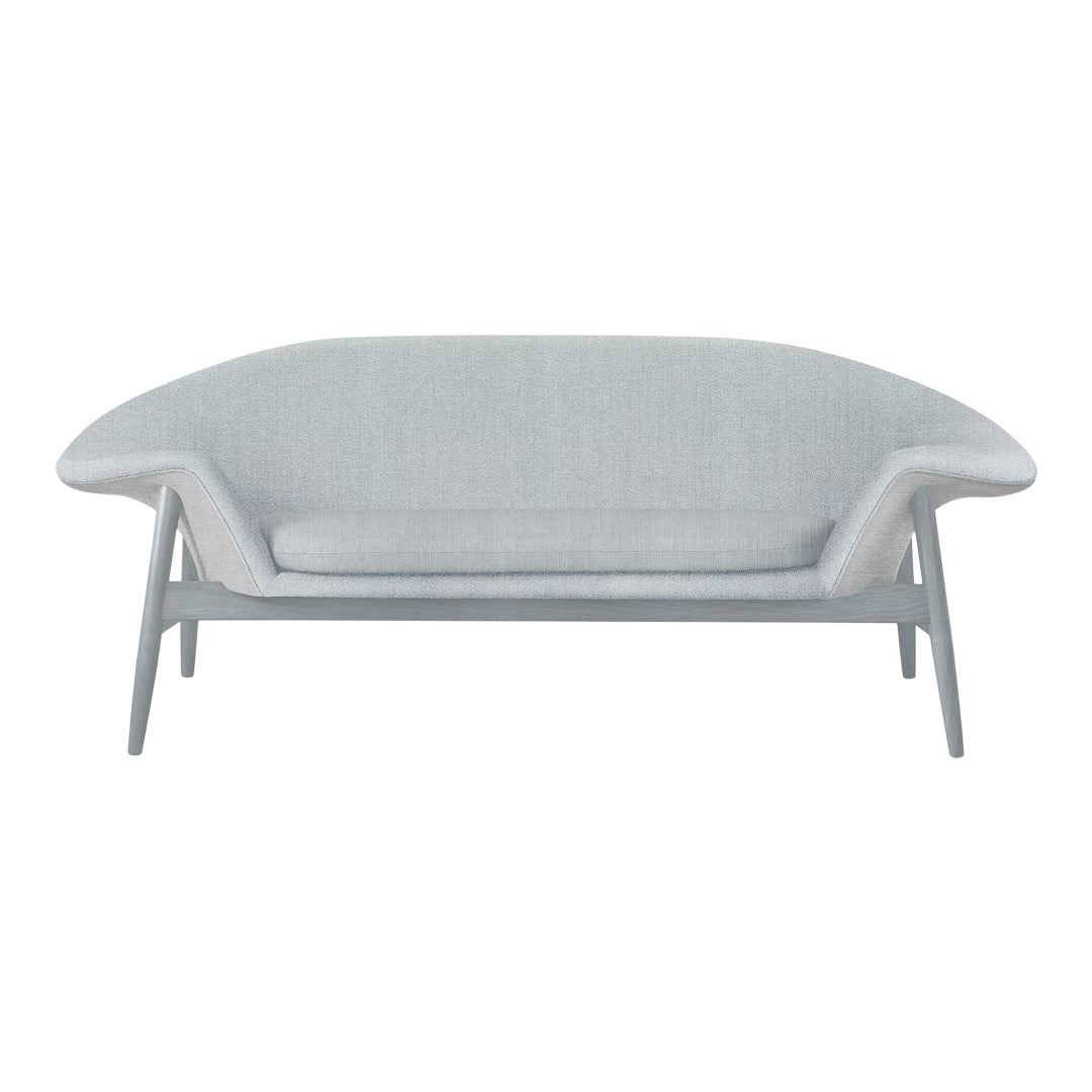 Light gray loveseat with a smooth, minimalist design and subtle textured pattern on the upholstery.