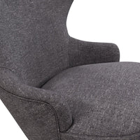 Gray upholstered chair with a sleek, textured pattern, perfect for modern living spaces.