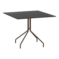 Black square tabletop with a minimalist design, supported by a sleek brown metal base. Perfect for modern decor.