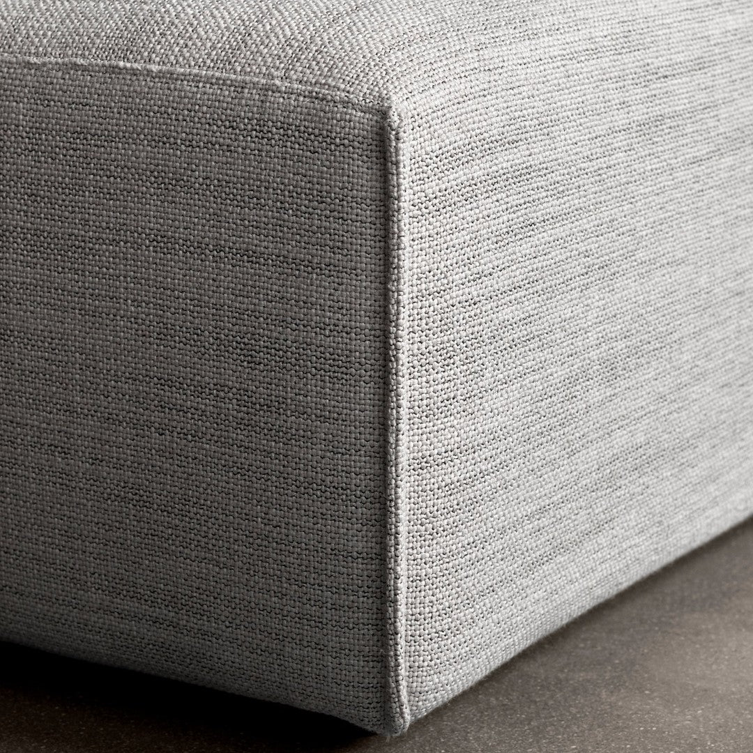 Gray textured fabric with a subtle, woven pattern, perfect for modern decor. Ideal for contemporary furnishings.